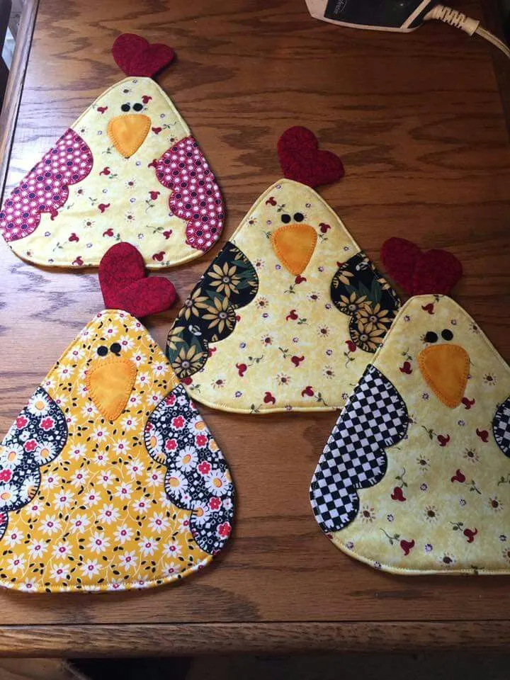 Patchwork chicken-themed potholders